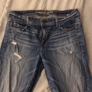 AE skinny holey jeans size 14
